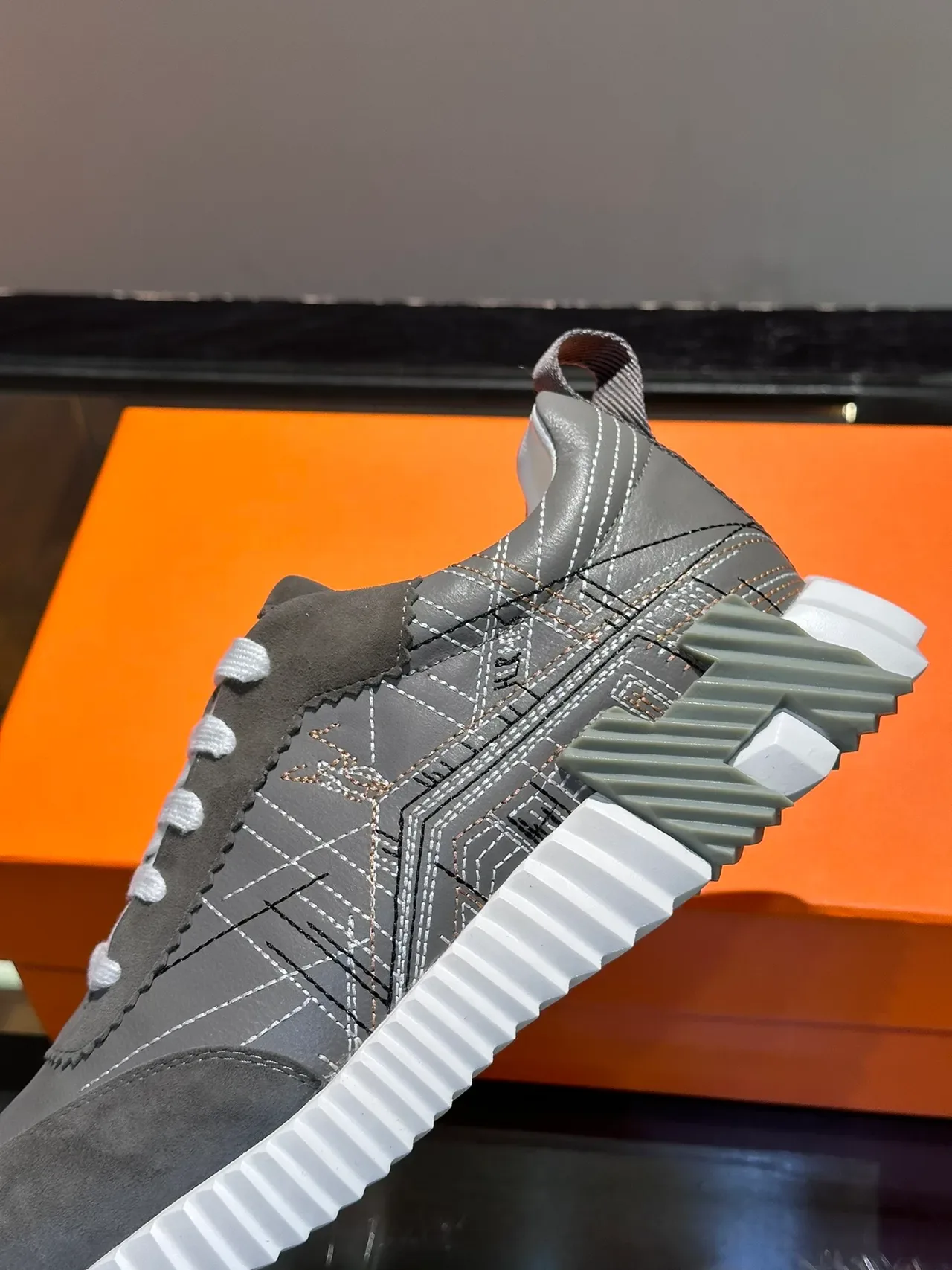 Hermès Gray White H-Shaped Heel Counter Ridged Midsole Lifestyle Sneakers 4