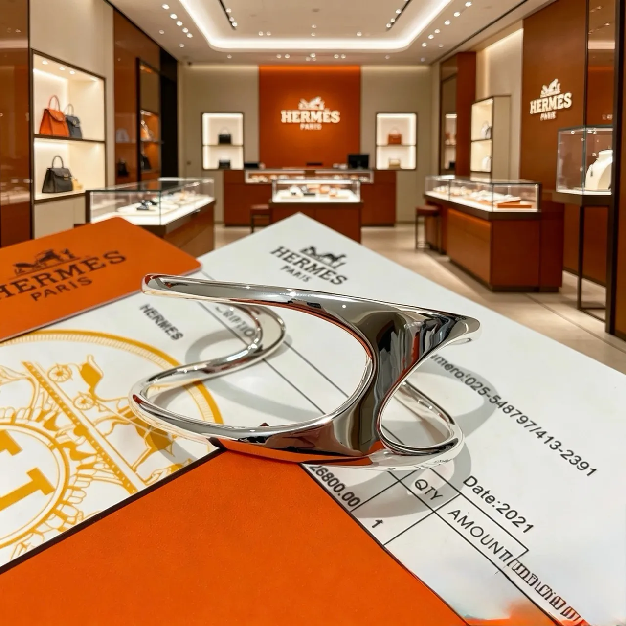 Hermès রূপালী চকচকে বিকৃত খোদাই কব্জির চুড়ি 5