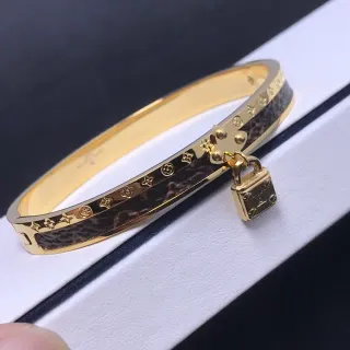Louis Vuitton Lockit Monogram منحوت ذهبي اللون جلد تضمين إسورة