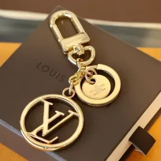 حامل المفاتيح Louis Vuitton LV Monogram ذهبي بني معدن مصقول سوار متشابك