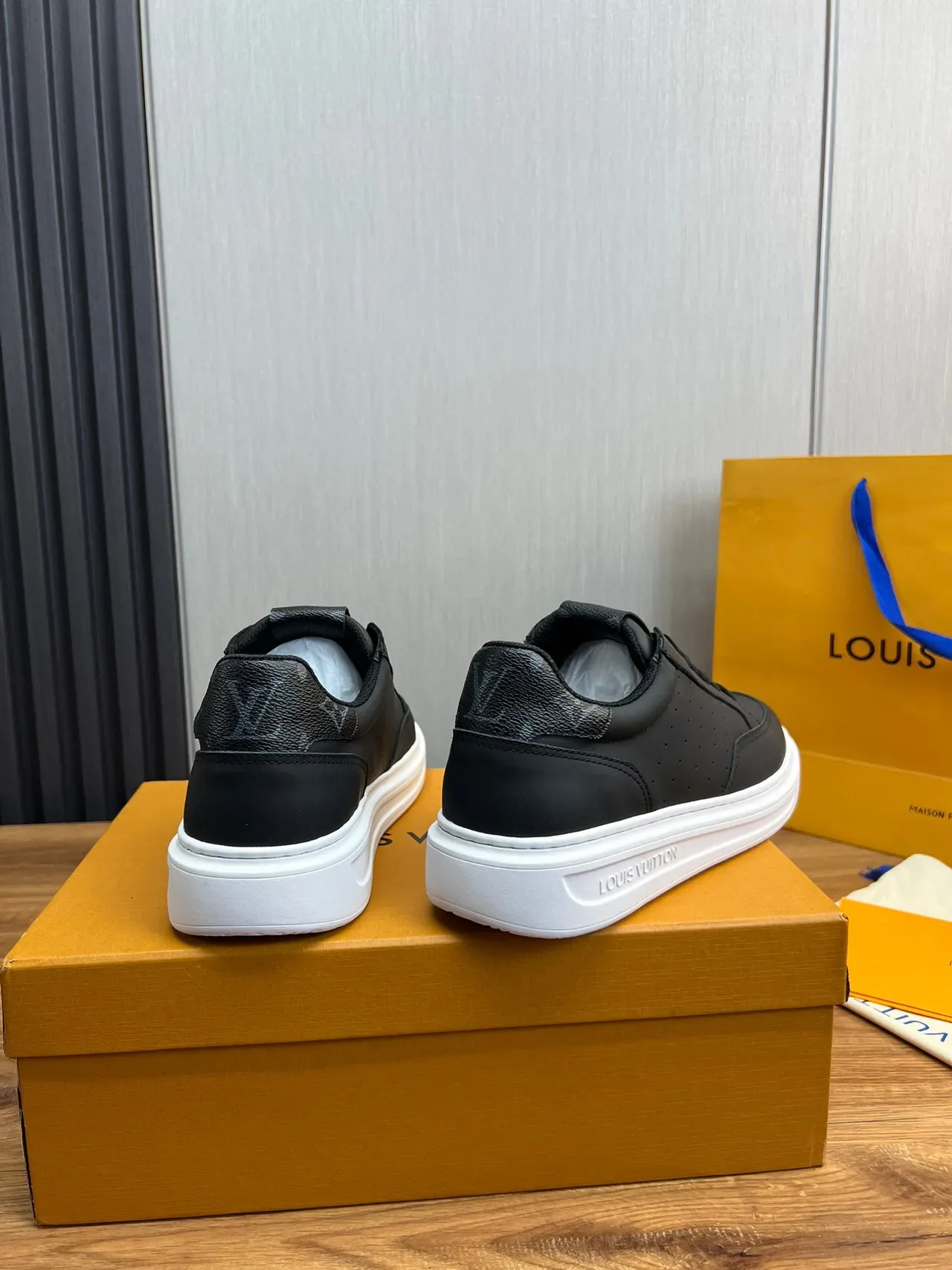 Louis Vuitton LV Trainer Black White Perforated Leather Upper Contrast Platform Sole Lifestyle Sneakers 2