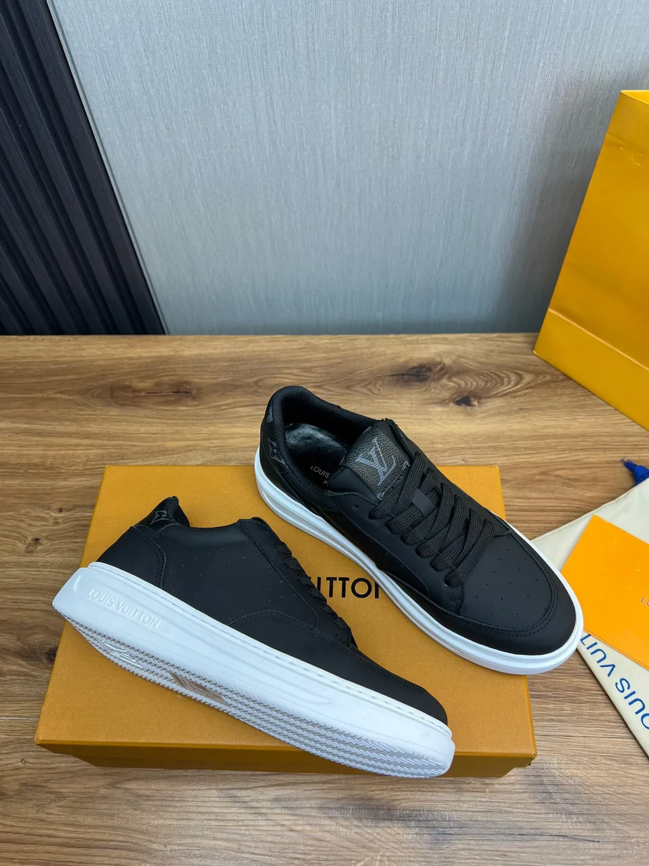 Louis Vuitton LV Trainer Black White Perforated Leather Upper Contrast Platform Sole Lifestyle Sneakers 3