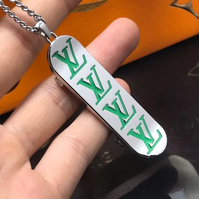 Louis Vuitton Monogram Orange Enamel Gold-Tone Pendant Necklace 4