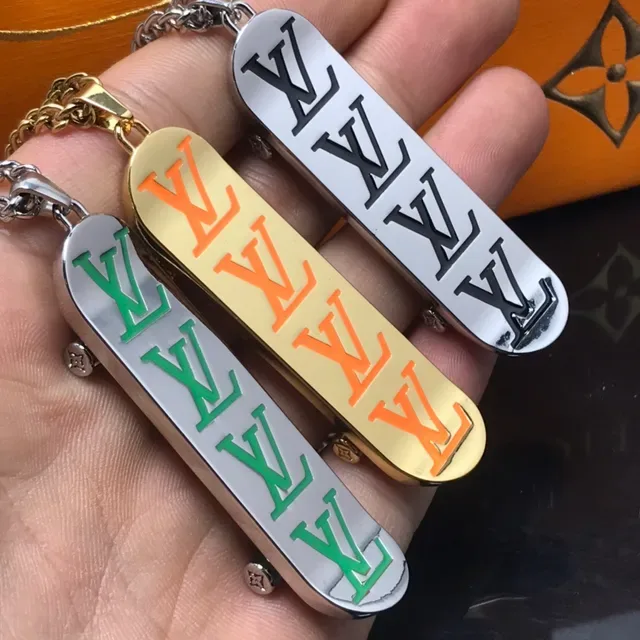 Louis Vuitton Monogram Orange Enamel Gold-Tone Pendant Necklace 5