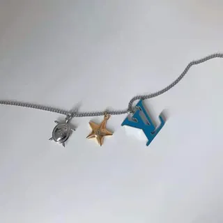Louis Vuitton Multi-Charm Esmaltado LV Star Tartaruga Colar