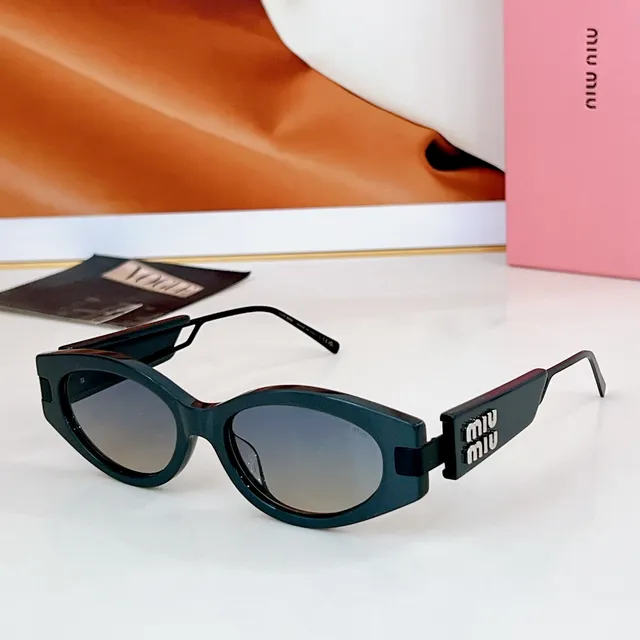 Miu Miu Lunettes de soleil cadre rectangulaire-ovale acétate noir-or épais 2