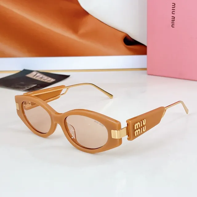 Miu Miu Lunettes de soleil cadre rectangulaire-ovale acétate noir-or épais 3