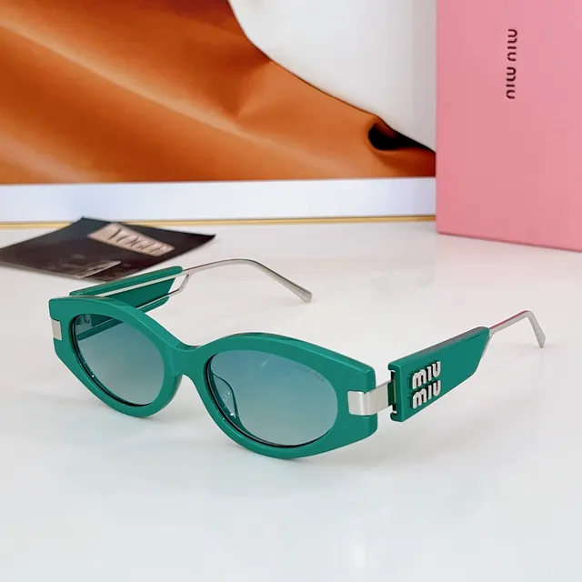 Miu Miu Lunettes de soleil cadre rectangulaire-ovale acétate noir-or épais 4
