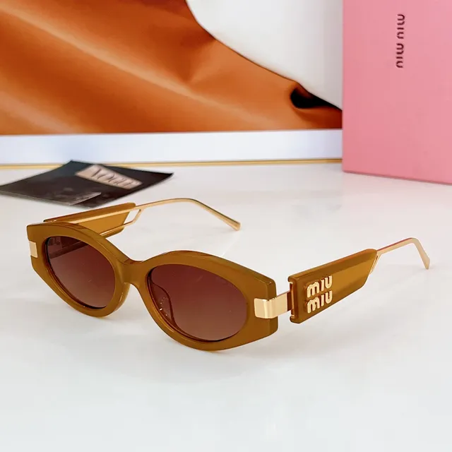 Miu Miu Lunettes de soleil cadre rectangulaire-ovale acétate noir-or épais 8