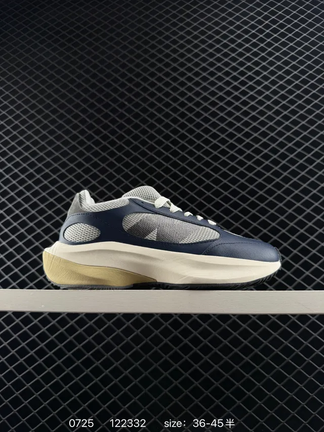 New Balance Warped Runner Navy and Beige Chunky Sneakers 4