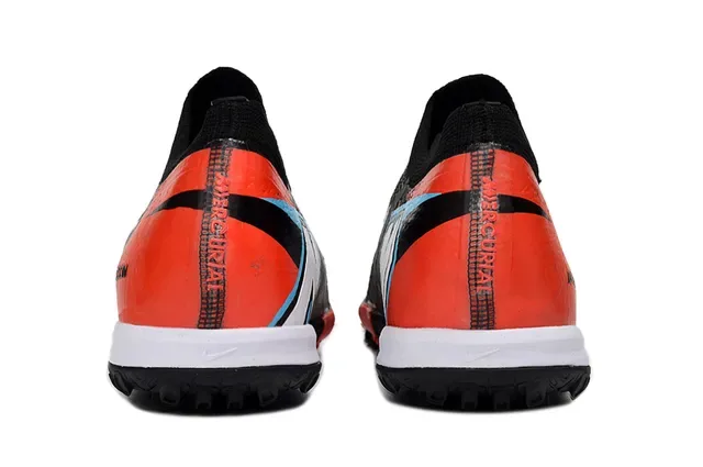 Nike أحذية كرة القدم باللون الأسود والبرتقالي مع upper من التنجيل وكعب turf 4