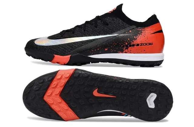 Nike أحذية كرة القدم باللون الأسود والبرتقالي مع upper من التنجيل وكعب turf 5