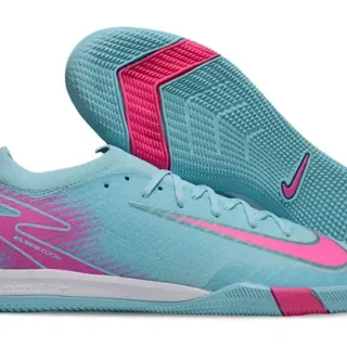 Nike أحذية رياضية زرقاء وردية منخفضة الكعبة بتصميم علوي مصنوع من تريكو اصطناعي