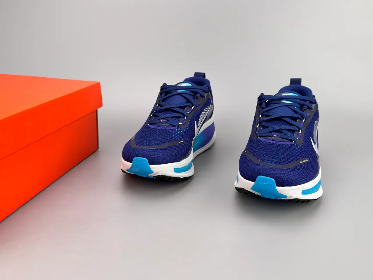 Nike Chaussures de running avec upper en knit ingénierie bleu et violet, motif ondulé sur la semelle ZoomX 3