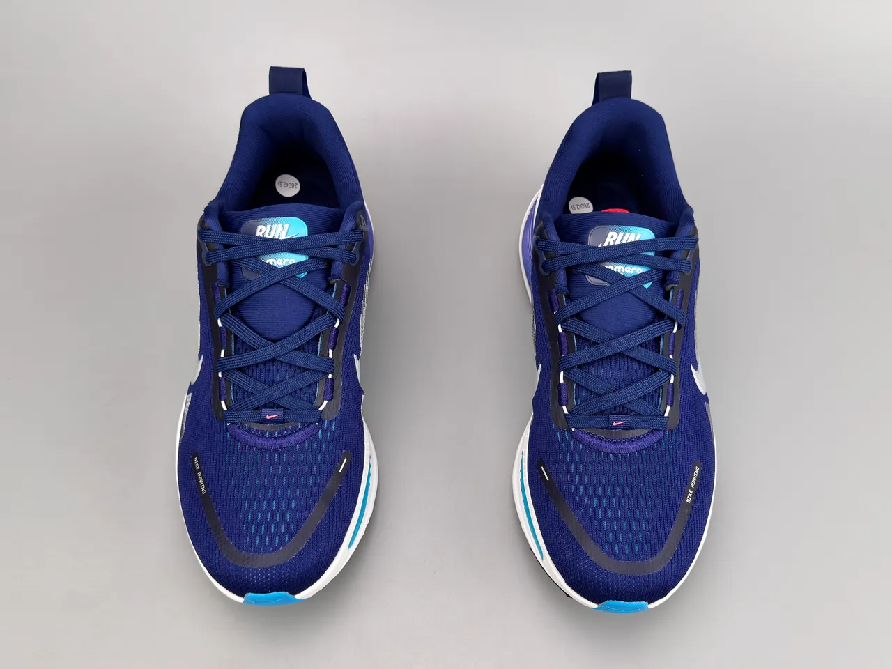 Nike Chaussures de running avec upper en knit ingénierie bleu et violet, motif ondulé sur la semelle ZoomX 9