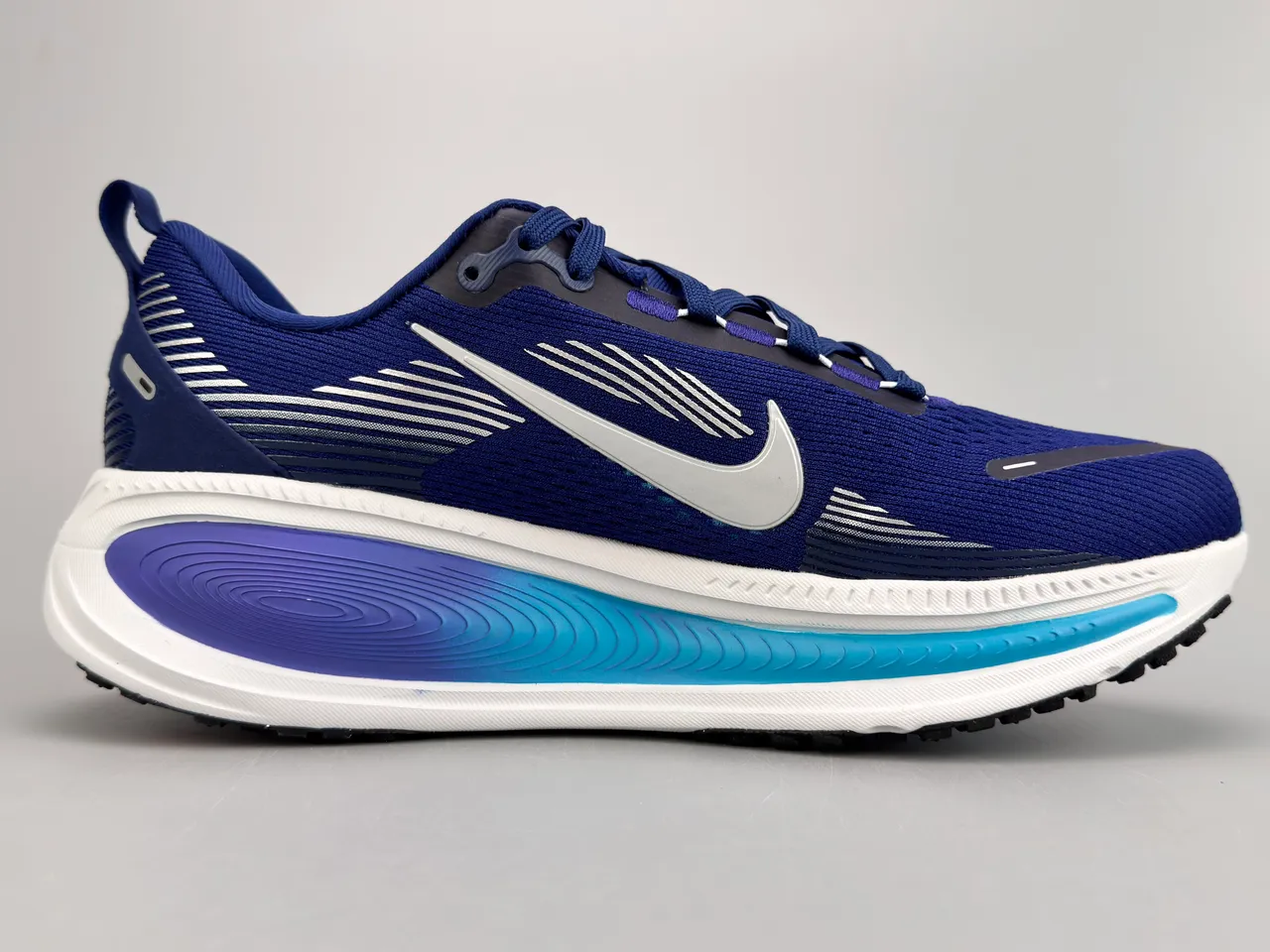 Nike Chaussures de running avec upper en knit ingénierie bleu et violet, motif ondulé sur la semelle ZoomX 10