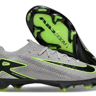 Nike Chaussures de football gris-vert avec upper en maille, accent néon, terrain ferme