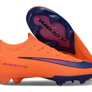 Nike Chaussures de football à empeine orange bleu en knit, col ajusté dynamique, pour terrain ferme