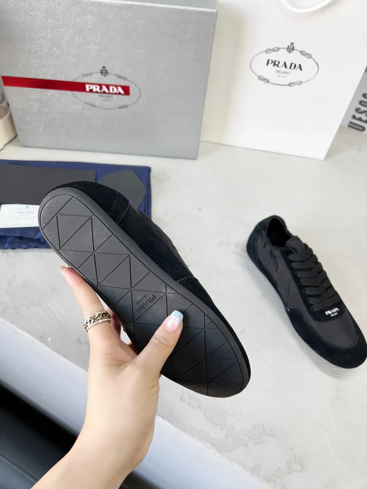 Prada Sneakers Lifestyle Noires basses mélange daim et nylon 9