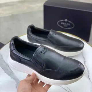 Prada Cloudbust काला चमड़ा प्लेटफॉर्म लोफर्स