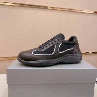 Prada Cloudbust काली सफेद मिश्रित चमड़ा और मेश अपर कंट्रास्ट पाइपिंग लाइफस्टाइल स्नीकर