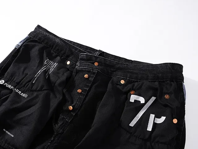 Jeans de Denim Preto Distressed com salpicaduras de tinta da marca Purple Brand 6