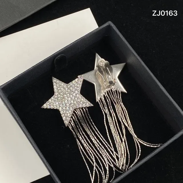 Saint Laurent Star Pavé Crystal Chain Fringe Earrings 5