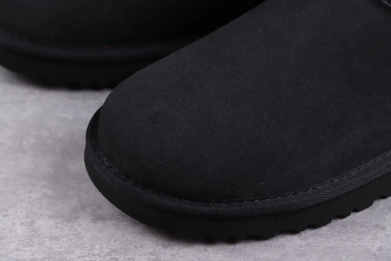 UGG Classic Mini काला शियरलिंग लाइनड स्नो बूट 4