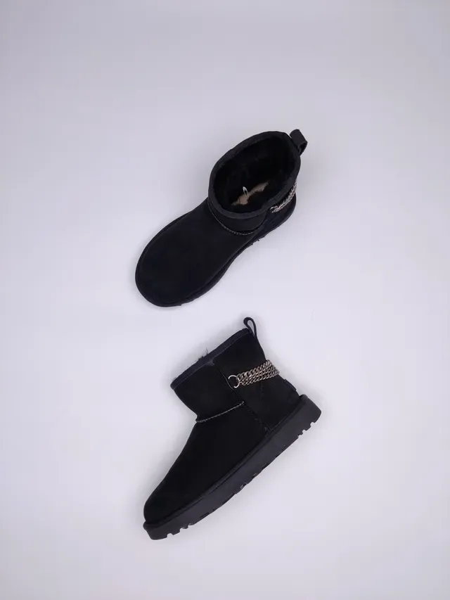 UGG Classic Mini काला सुड शियरलिंग लाइनड स्नो बूट 4
