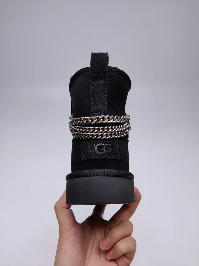 UGG Classic Mini काला सुड शियरलिंग लाइनड स्नो बूट 10