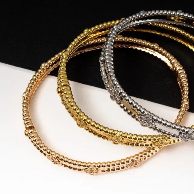 Van Cleef & Arpels আলহামব্রা গোলাপি সোনা ডায়মন্ড কোয়াট্রফয়েল বিন্দু ব্যাঙ্গল ব্রেসলেট 2