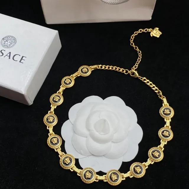 سوار Versace Greca Odissea Medusa Medallion ذهبي أسود مينا 9