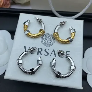 Versace Boucles d'Oreilles Argent et Or Bande Ressort Enroulée Détails Cubes Géométriques