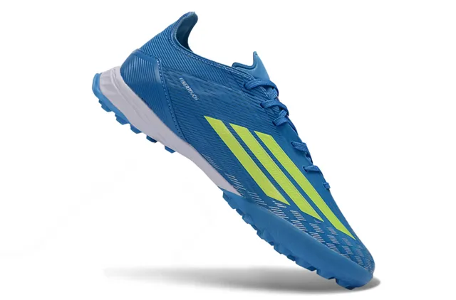 Adidas Tênis de futebol turf sintéticos azul e amarelo com upper texturizado e acanalado de baixo corte 2