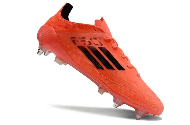 أحذية كرة القدم أديداس F50 برتقالية وأسود للأرض الصلبة 2