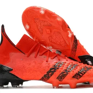 Adidas Orange Black Patrón de escala texturizado Alto tobillo Superficie firme Zapatillas de fútbol