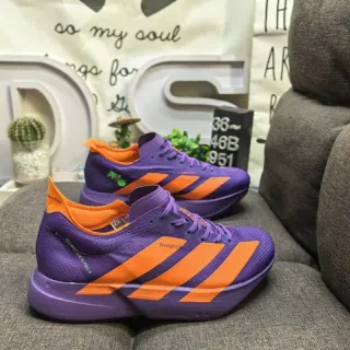 Adidas tênis roxos e laranjas para correr