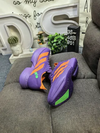 Adidas बैंगनी और नारंगी रनिंग शूज़ 6