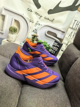 Adidas बैंगनी और नारंगी रनिंग शूज़ 9