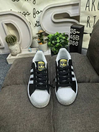 Adidas Superstar أحذية رياضية أسود وبيضاء للستايل الحياتي 10
