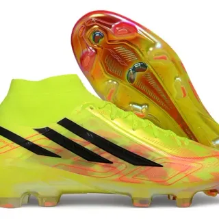 Adidas Chaussures de football pour terrain ferme avec upper de style chaussette en jaune orange néon, semelle transparente avec dégradé