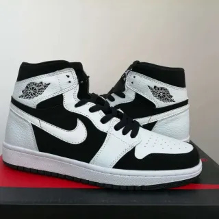 Tênis de basquete de cano alto Air Jordan 1 preto e branco