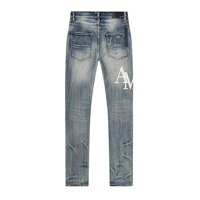 Amiri Jeans Bleu et Blanc Distressed avec Impression Graphique 3