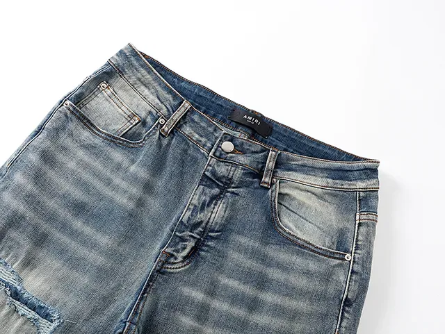 Amiri Jeans Bleu et Blanc Distressed avec Impression Graphique 4
