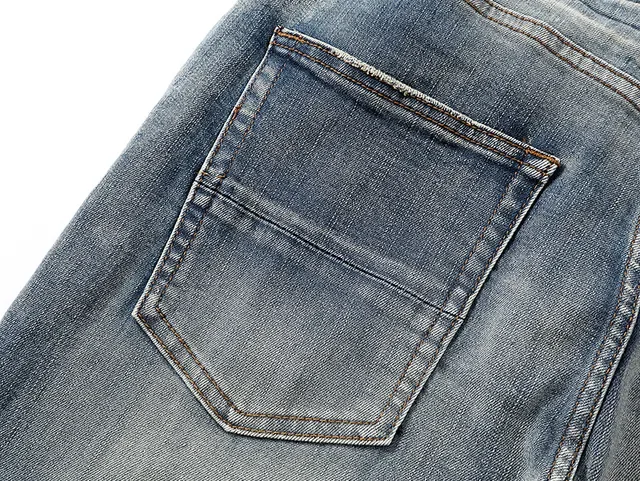 Amiri Jeans Bleu et Blanc Distressed avec Impression Graphique 9