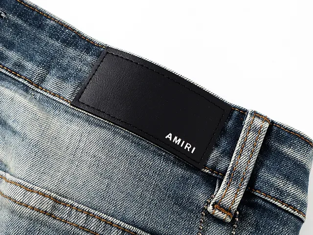 Amiri Jeans Bleu et Blanc Distressed avec Impression Graphique 12