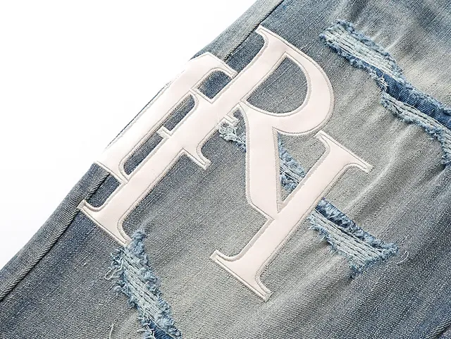 Amiri Jeans Bleu et Blanc Distressed avec Impression Graphique 16