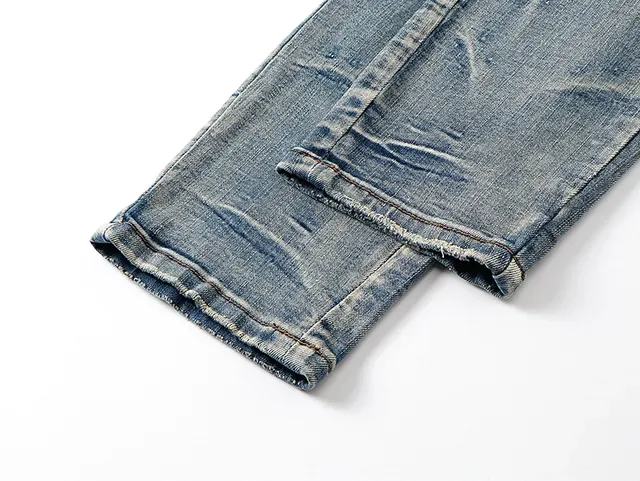 Amiri Jeans Bleu et Blanc Distressed avec Impression Graphique 17