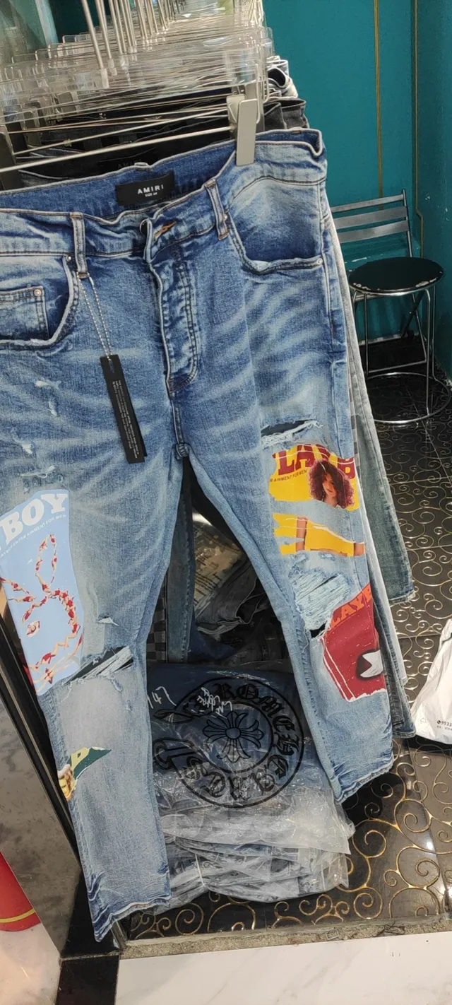 Amiri Graphic Patchwork Distressed Slim-Fit Jeans 16