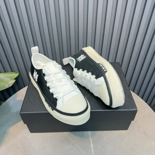 Amiri Skel Top Low Black and White tênis lifestyle 4